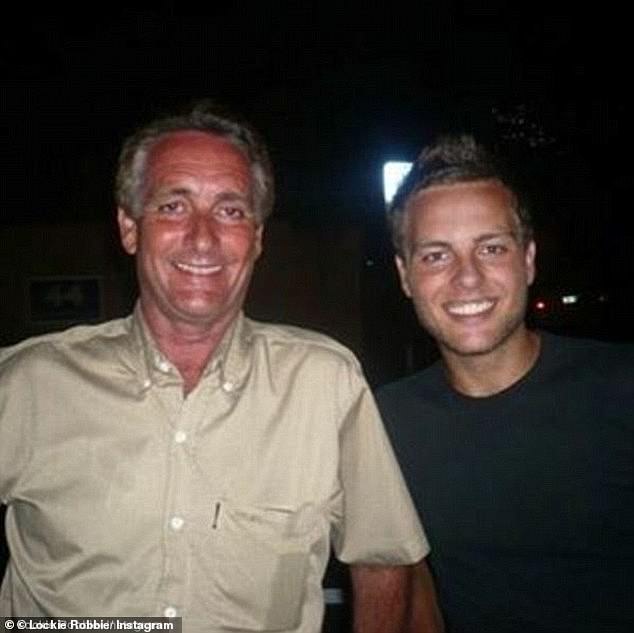 Doug Robbie, a retired sugarcane farmer and real estate developer now living in Airlie Beach, pictured with his son Lachie