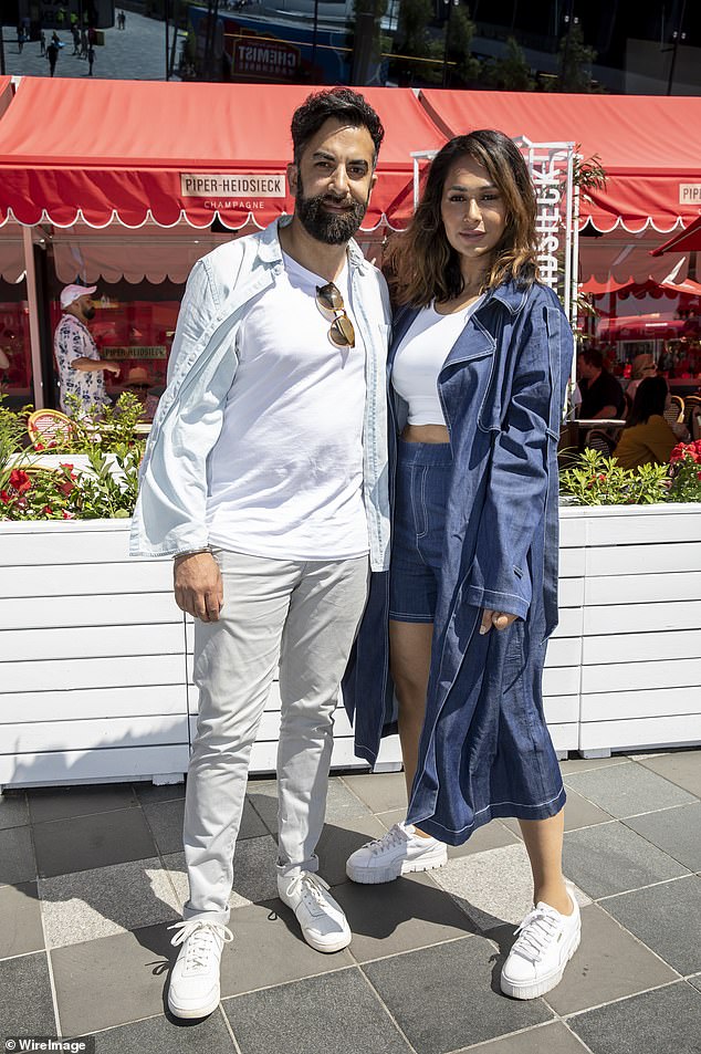 The Block's Sharon Johal, 35, (right) and Ankur Dogra, 45, (left) also dressed to impress with the former Neighbors star opting for a faux denim outfit.