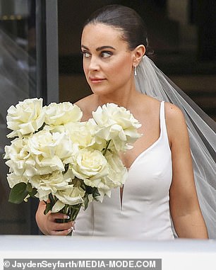 Flanked by a cameraman, Bronte looked nervous as she prepared to marry her mystery husband, who has been identified as Harrison Boon.