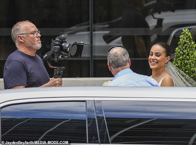 Before getting into the limo, Bronte was seen laughing and joking during a quick conversation with a male family member.