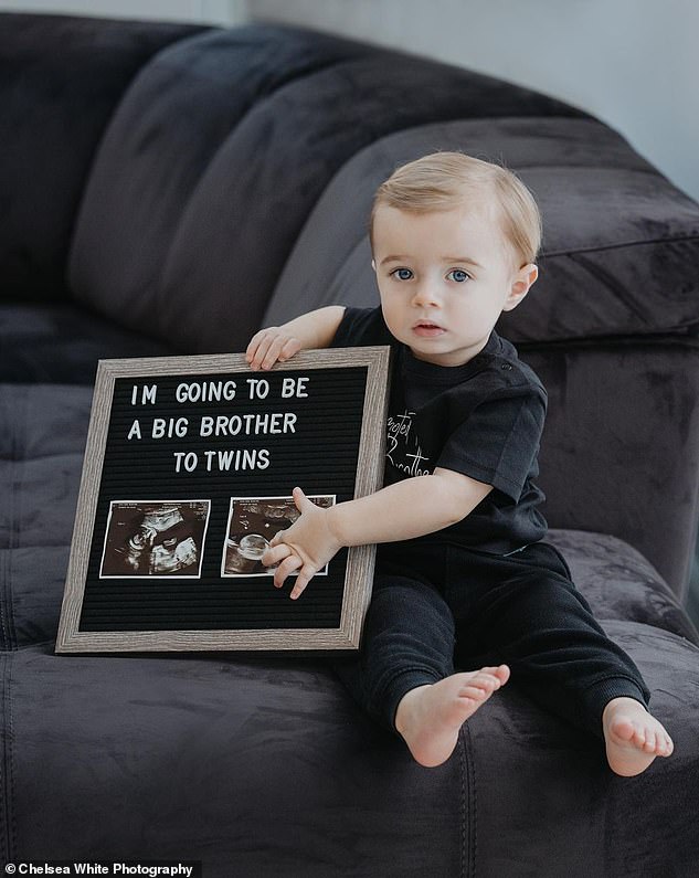 Adorable: The influencer posted a photo of her son Santiago, whom she shares with her ex Sammy Kimmence, holding a sign that said they would become a brother.