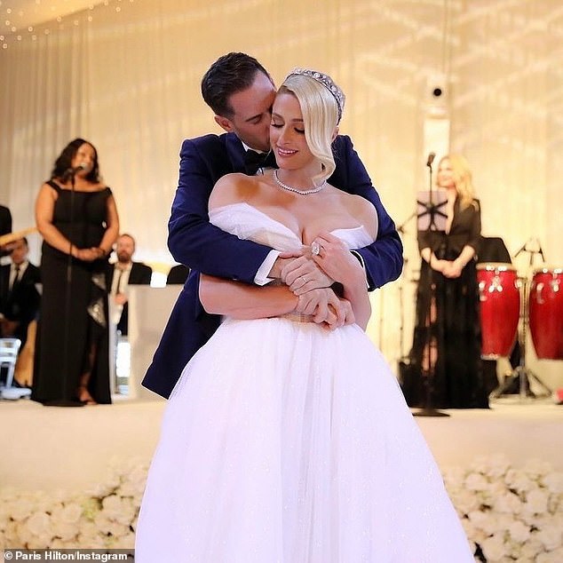 The big day: Paris married 41-year-old businessman Carter Reum in 2021 and danced with him at his reception in one of the photos shared.