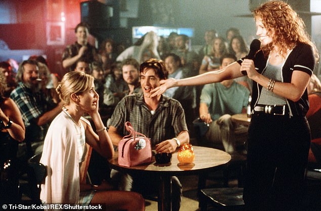 Karaoke scene: Julia, 55, played food critic Julianne 'Jules' Potter in My Best Friend's Wedding, which also starred Dermot Mulroney and Cameron Diaz.