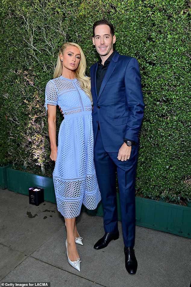 Paris and her husband Carter Reum (pictured in 2022) welcomed both of their children with the help of a surrogate and IVF