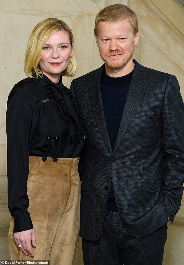 Beaming: It came after the couple smiled for the camera at Paris Fashion Week on Monday (pictured) before taking a front-row seat at Dior