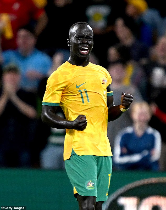 Soceroo Awer Mabil (pictured) was crowned Young Australian of the Year with his proud mother and uncle accepting the award on his behalf.