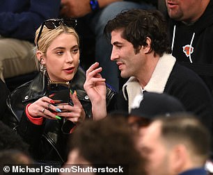 Thrilled: The couple, who have been spotted at NBA games recently, seemed thrilled to be at the game