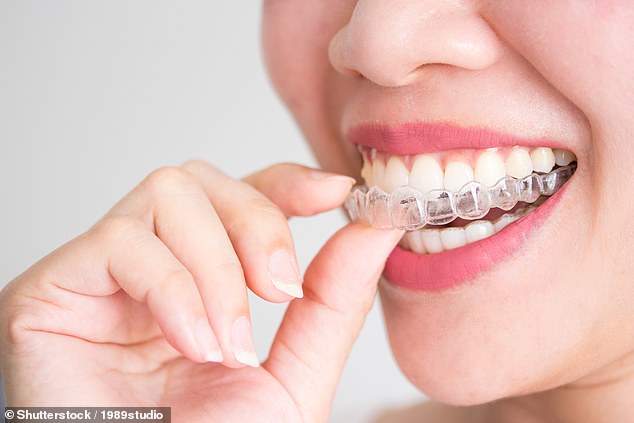 Dr Jethwa says the 'slurping' noise some patients make while taking out retainers - which hgold teeth in place - is 'gross' (file photo)