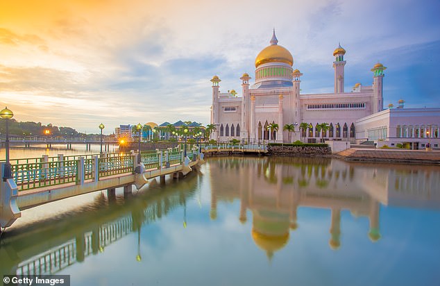 The couple held their Islamic ceremony at the Omar ¿Ali Saifuddien Mosque (pictured), which is one of Brunei's national monuments.