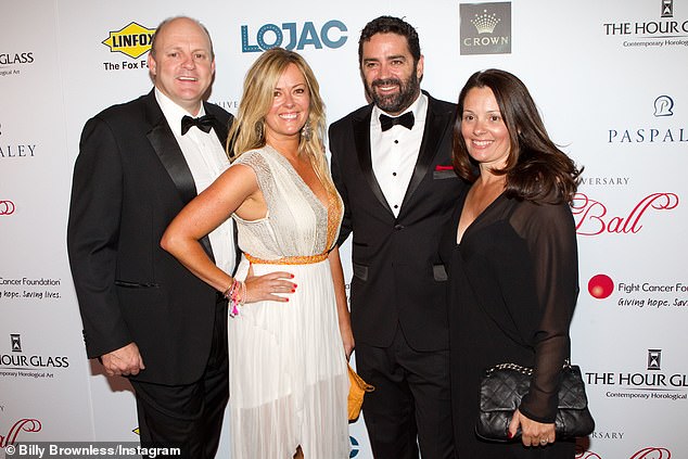 Billy's 18-year marriage to wife Nicky ended sensationally in 2016 after she began dating his best friend, fellow AFL star Garry Lyon.  Billy and Nicky Brownless (left) are pictured with Garry and Melissa Lyon (right) in 2012