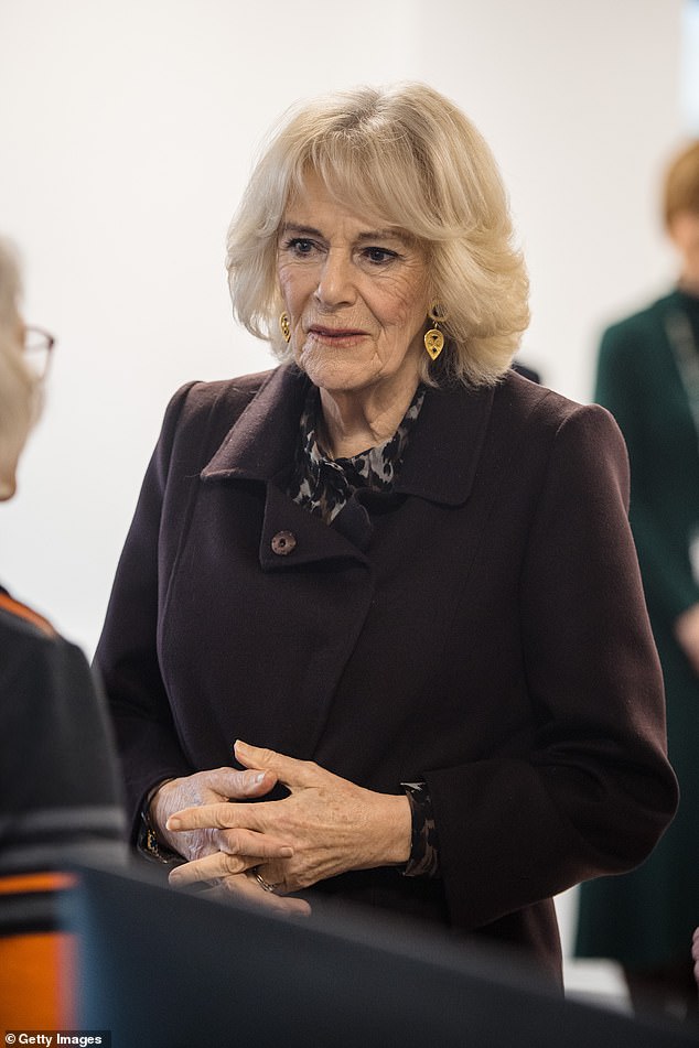 Camilla donned a light makeup palette during her visit, but added a pop of color with pink lipstick.