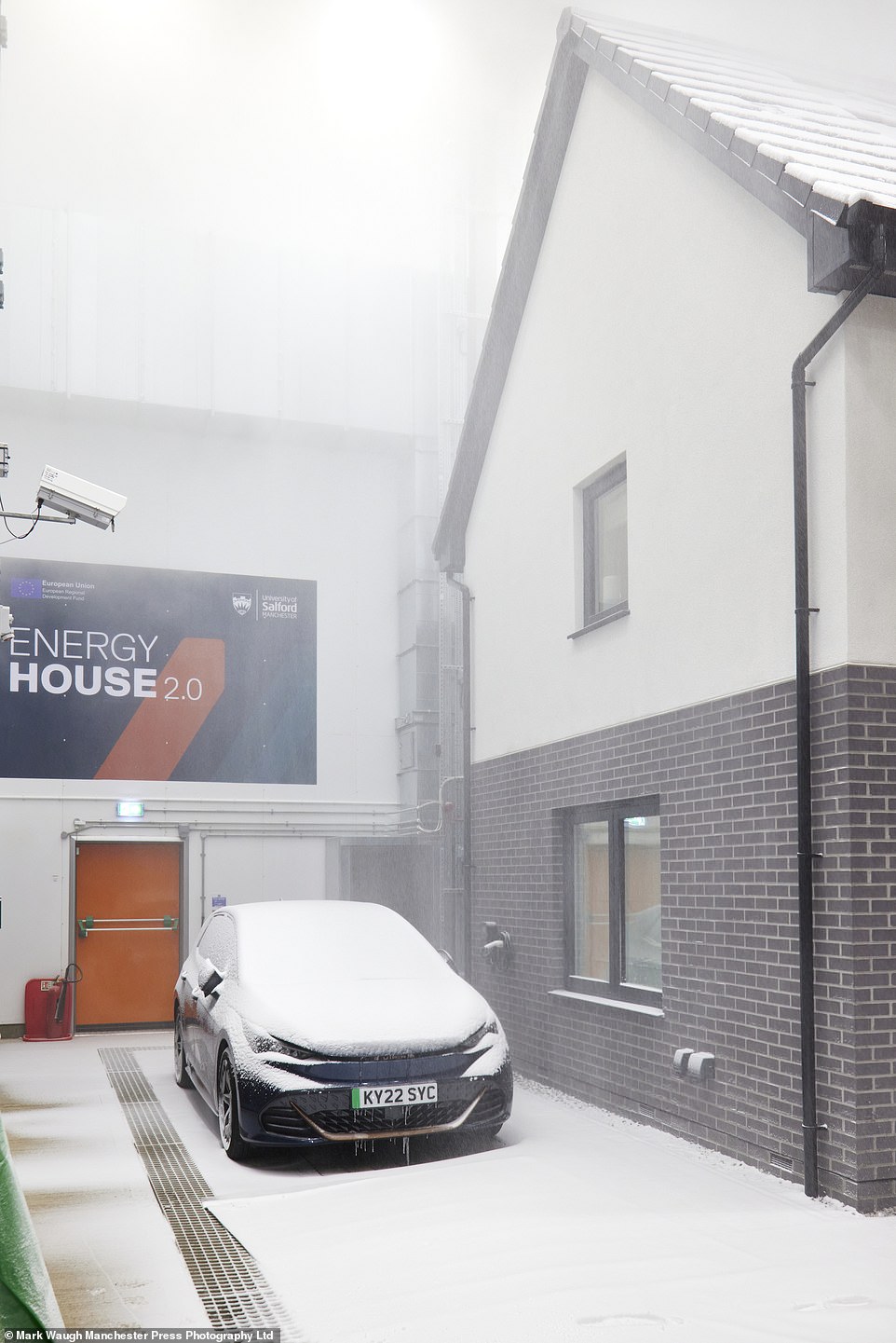 Upon arrival, the chamber, which can fit up to 24 double-decker buses, was set to a cool 23°F (-5°C). But with the click of a button, scientists in the control room had forced the temperature down to 3.2°F (-16°C), with snow blasting out of a machine onto a house