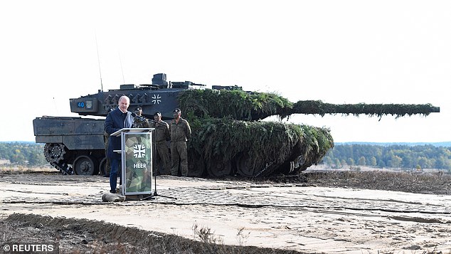 For too long, the German chancellor has dragged his heels over the move, ignoring the increasingly urgent demands of his Nato allies to help the Ukrainians. Pictured: Scholz with a Leopard 2 tank in October