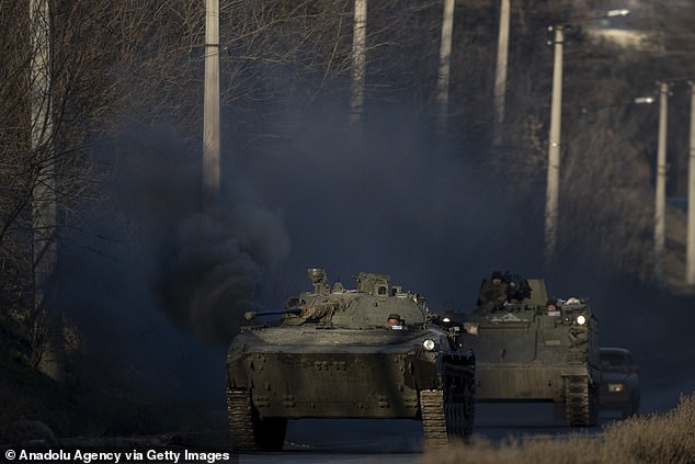 Ukrainian soldiers are seen on their ways to frontlines with their armoured military vehicles as the strikes continue on the Donbass frontline