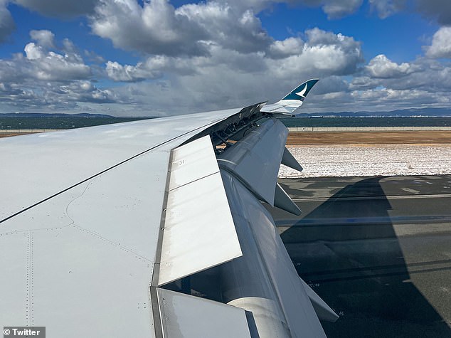 Jetstar flight was delayed due to snow on the ground (pictured) at Kansai International Airport in Osaka