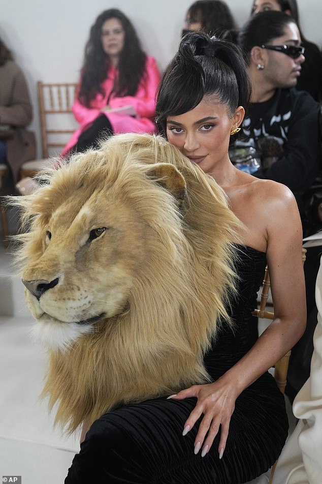 Unique: It comes after Kylie grabbed attention at Paris Fashion Week on Monday by making a quirky appearance at the Schiaparelli show with a fake lion's head attached to her dress.