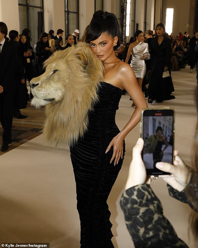 Quirky Look: She debuted in a stunning, curve-hugging black dress, but it was the huge, lifelike lion head attached to the front that drew the most attention.