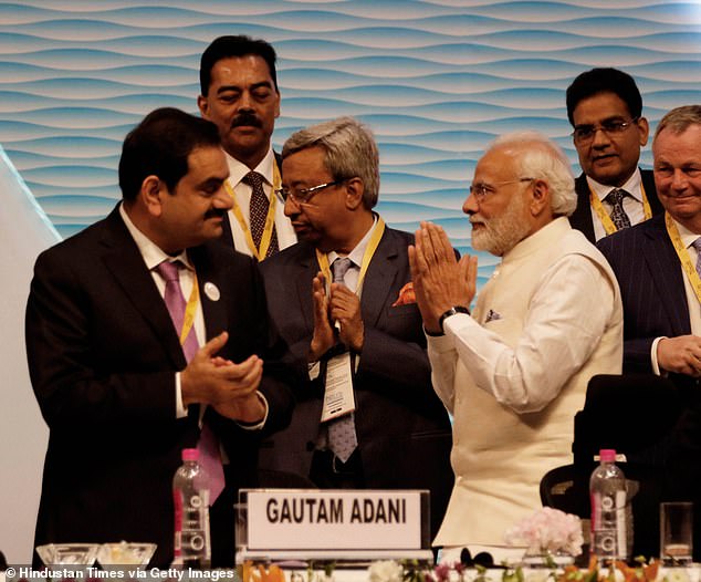 Hindenburg's two-year investigation alleges that Adani, his family and close associates mixed money to manipulate stocks and hide debts.  Adani is among the most powerful men in India and remains a close ally of Prime Minister Narendra Modi.  The two are shown in 2019.