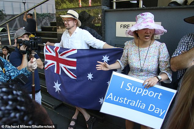 Counter-protesters show their support for Australia Day at an Invasion Day rally in Sydney on Thursday.