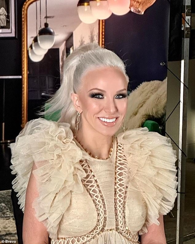 Feminine: Margaret Josephs wore her platinum blonde hair in a high ponytail and went for a glam makeup look, made up of bright nude lipstick and lots of mascara