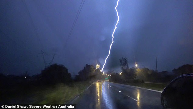 Sydney recently experienced heavy rain and thunderstorms on Tuesday night (pictured) as Camden Airport recorded over 20,000 lightning strikes and 20mm of rain in 10 minutes