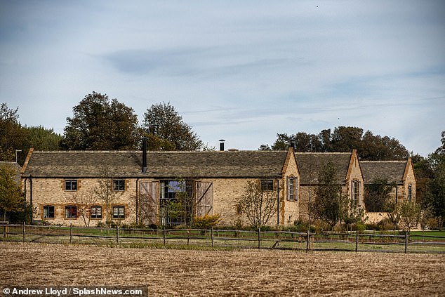 Installation: The couple built the outdoor installation next to their wooden latrine in the grounds of their country house in Chipping Norton, Oxfordshire, according to reports