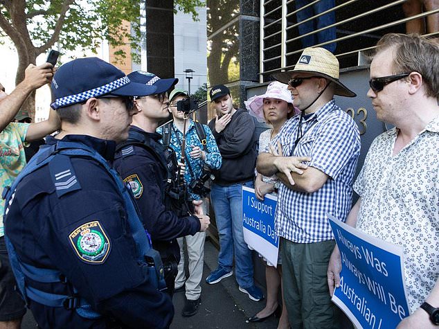 Police quickly moved counter-protesters (pictured)