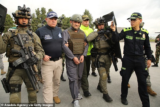 Dairo Antonio Úsuga David (in the center of the photo) was the leader of the largest drug gang in Colombia, known as the feared Clan del Golfo.  He has now been extradited to the US.