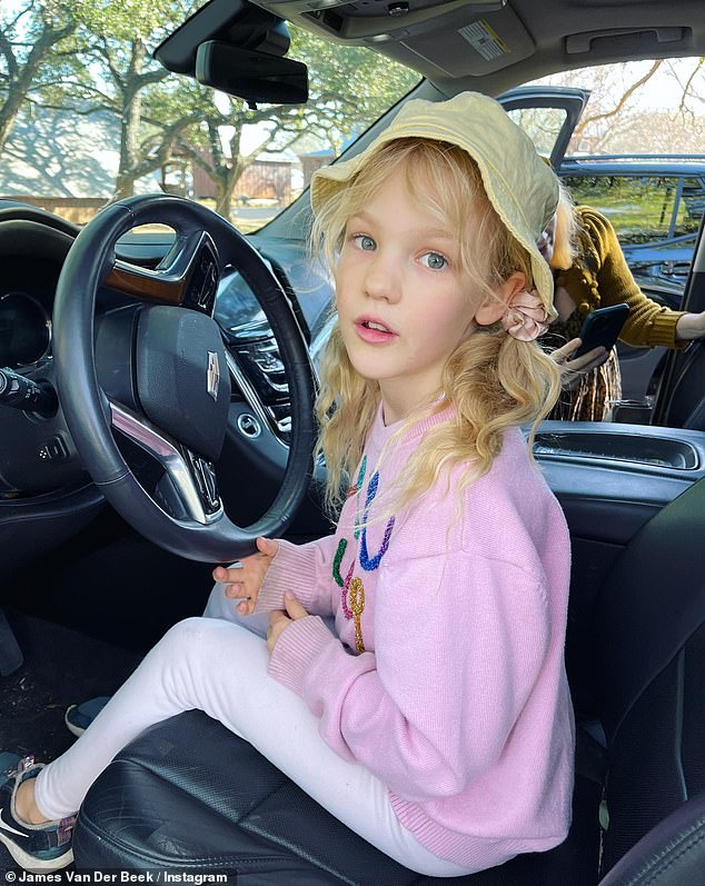 Behind the Wheel of Life: In the only photo that did not include her father, Annabel can be seen sitting behind the wheel of the family car as she looks to her left directly into the camera.