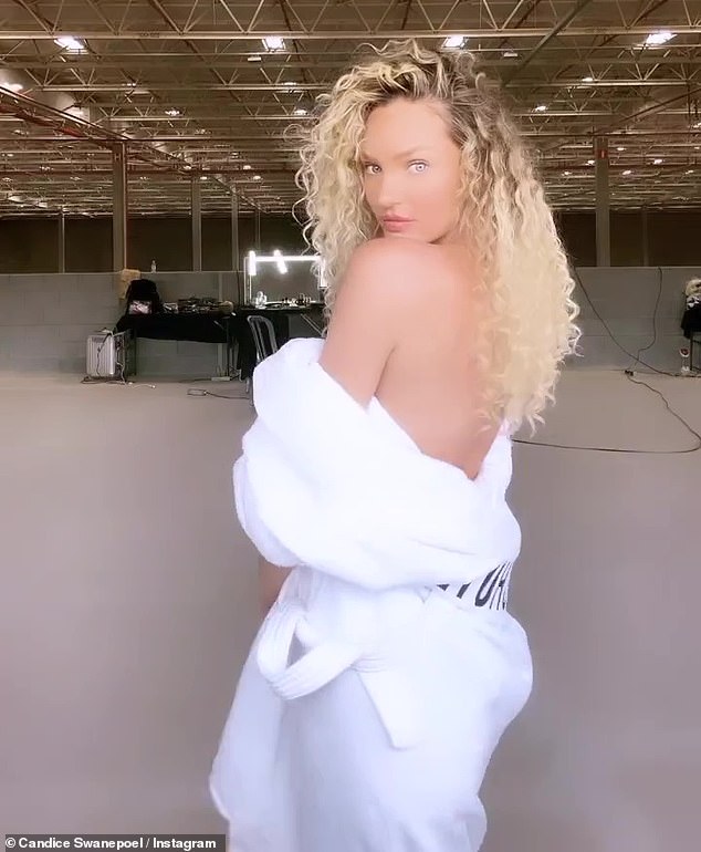 Fresh look: The 34-year-old supermodel showed off a new look of bouncy, voluminous curly hair while on the set of a photo shoot