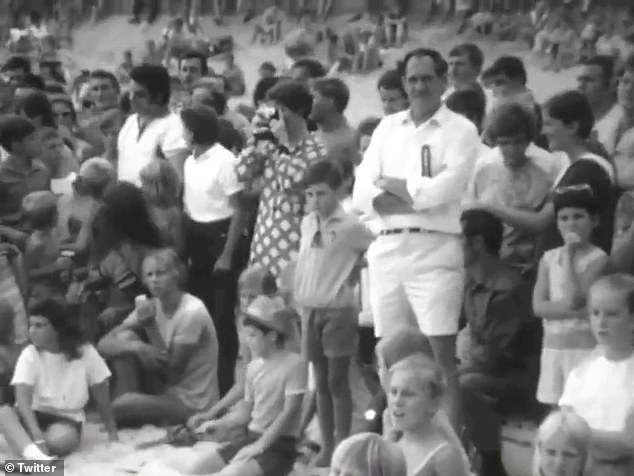 The historic video showed large crowds, without an Australian flag in sight, looking curiously at the men in blackface.