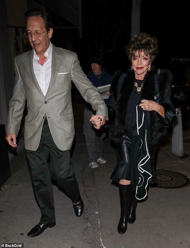 Lasting love: Hollywood's grande dame walked arm in arm with her loving husband of 20 years as they made their way to the restaurant