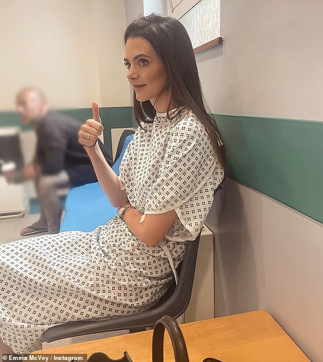 'Turbulent and unpredictable': Gaz Beadle's wife Emma, ​​29, detailed her health issues while spending time in hospital ahead of her heart surgery, taking to Instagram to share a snap wearing a gown hospital.