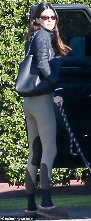 Looking fab: The 27-year-old supermodel was up for the task in a pair of jodhpurs that emphasized her gyro legs and pert butt