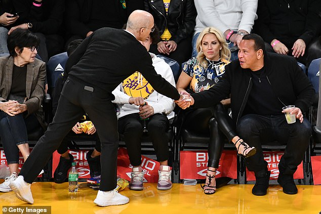 Pals: Showing off his connections, the jock was photographed shaking hands with director Jeffrey Katzenberg, who stopped by to say hello.