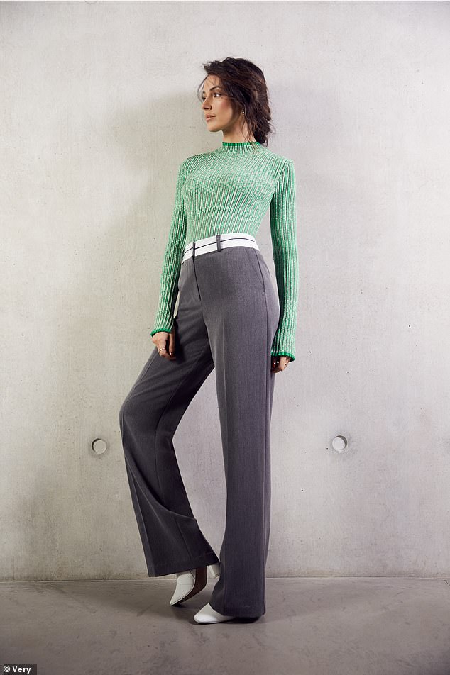 Gorgeous: In other snaps, she was wearing a fitted green top and gray high-waisted pants