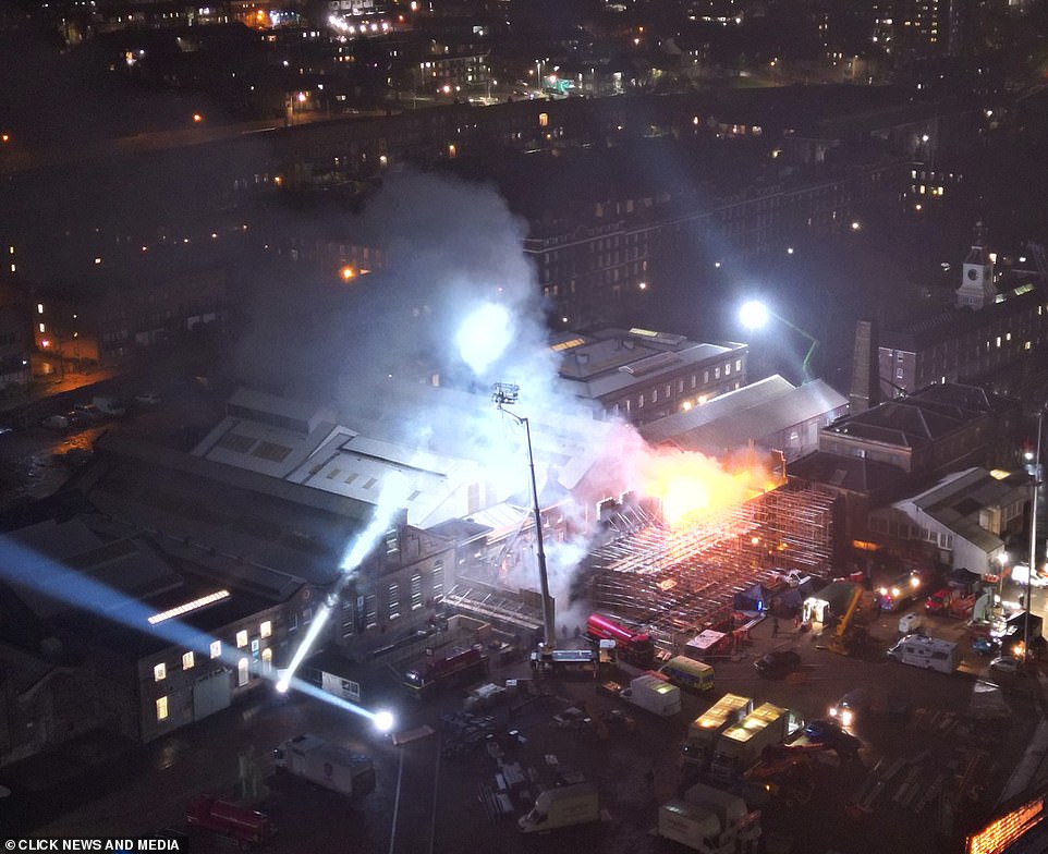 This aerial shot showed the spotlights and explosions occurring at the same time that the film was continuing its development.