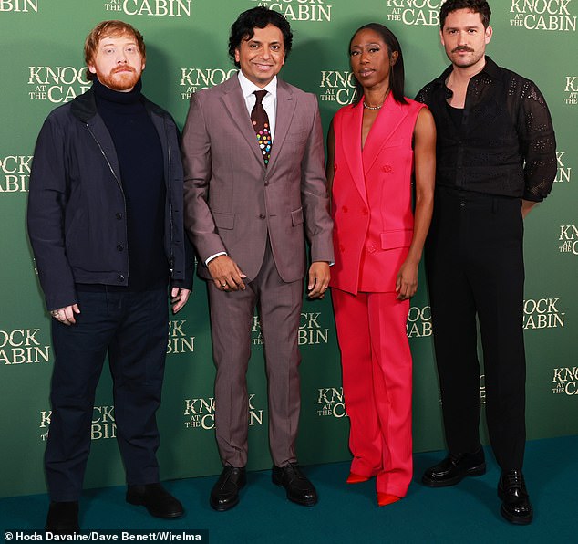 Cast & Crew: She looked dapper in a blue turtleneck sweater for the event (pictured left to right: Rupert, director M.Night Shymalan, and co-stars Nikki Amuka-Bird and Ben Aldridge)