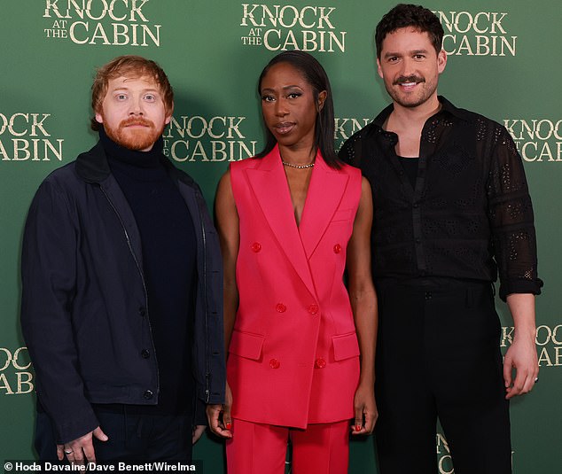 Pals: Rupert, Nikki and Ben pose together on the red carpet for the event at Vue West End celebrating the new movie