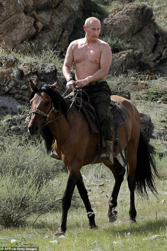 Vladimir Putin pictured topless riding a horse while on vacation in southern Siberia in 2009