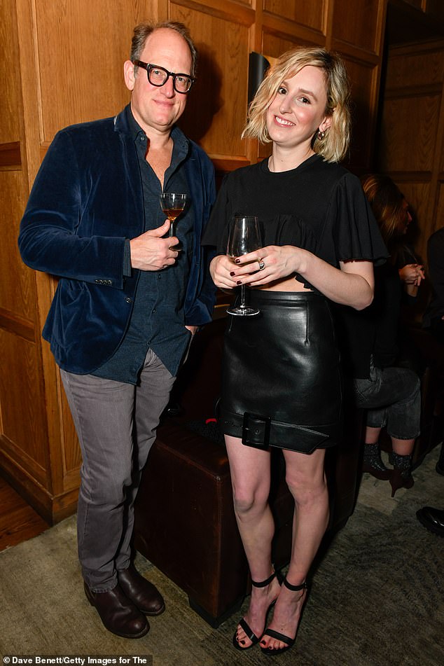 Night out: The actress wore her short blonde locks in tousled curls  In the photo with Alexander Loehnis