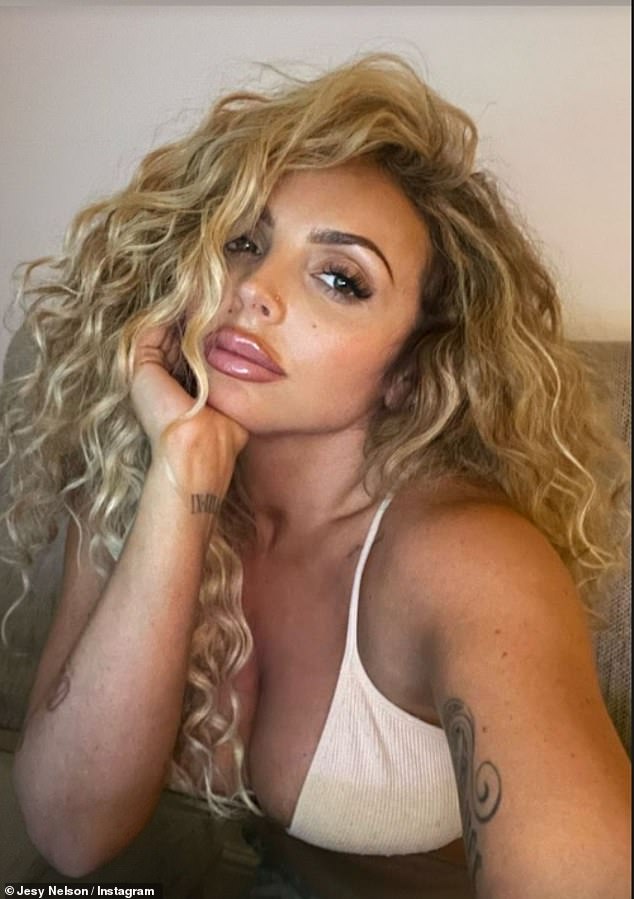 No longer single: It comes after Jesy looked more loved than ever while enjoying a romantic date with rapper boyfriend Zion Foster on Monday at Port Lympne Safari in Kent.