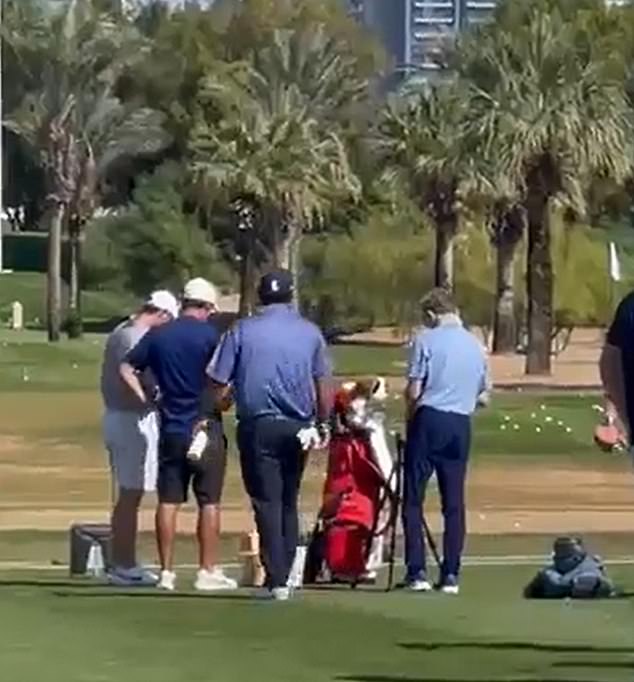 The footage shows Patrick Reed (second right) getting close to Rory McIlroy (left) in Dubai.