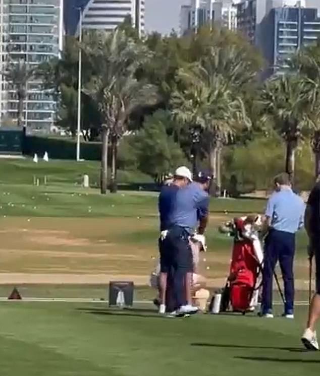 After McIlroy ignores the American, Reed turns to throw one of his jerseys at the world number 1.