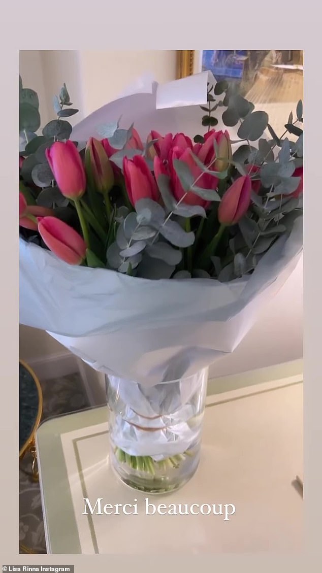 Tiptoeing Through the Tulips: Lisa shared a snapshot of a gorgeous bouquet of pink tulips in a glass vase with the caption 