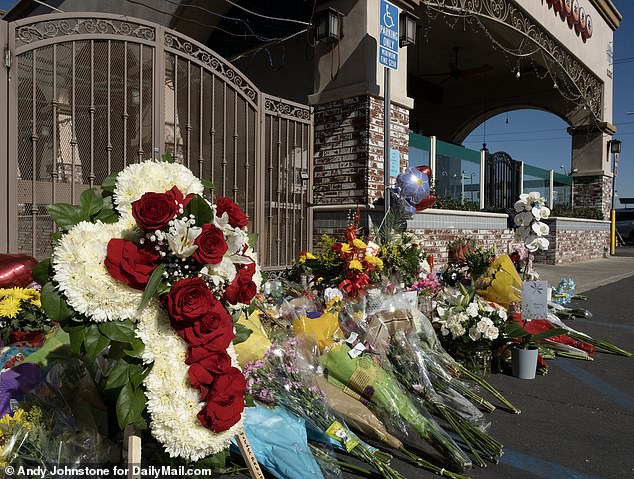 Local community members have left flowers at a memorial outside the Star Ballroom dance studio.