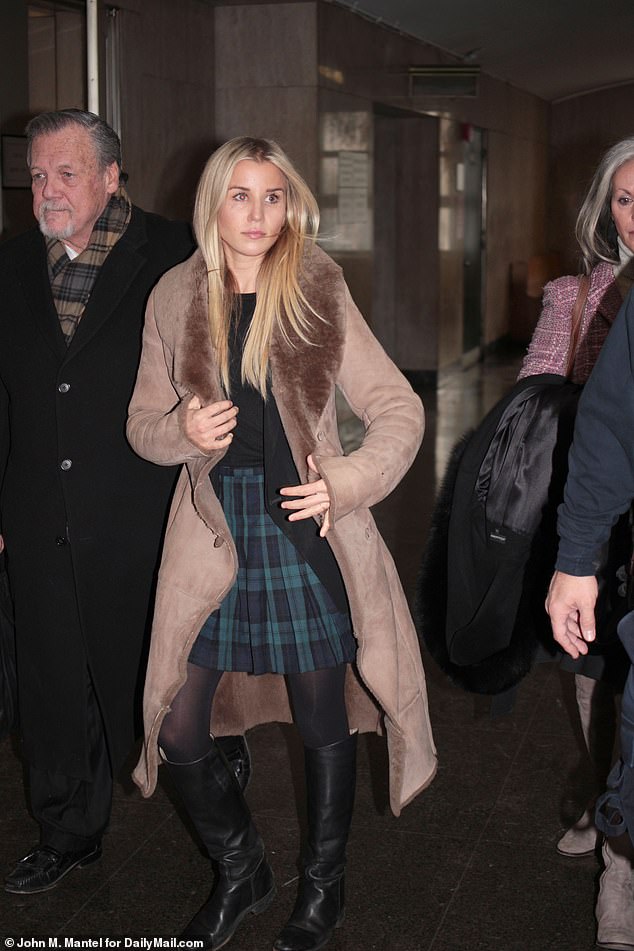 Caroline pictured walking into court after stealing $110,810 in a credit card scam