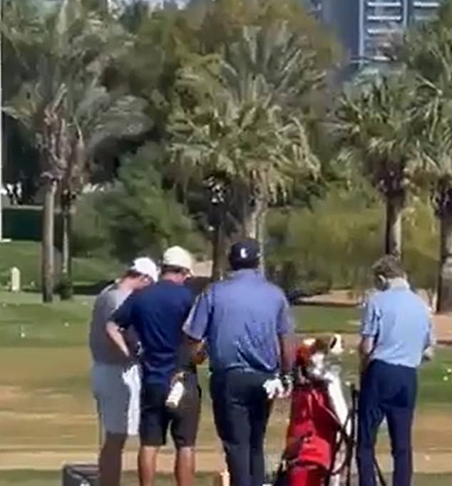 The footage shows Patrick Reed (second right) getting close to Rory McIlroy (left) in Dubai.