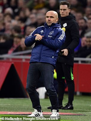 Schreuder is followed out of the club by his assistant Matthias Kaltenbach