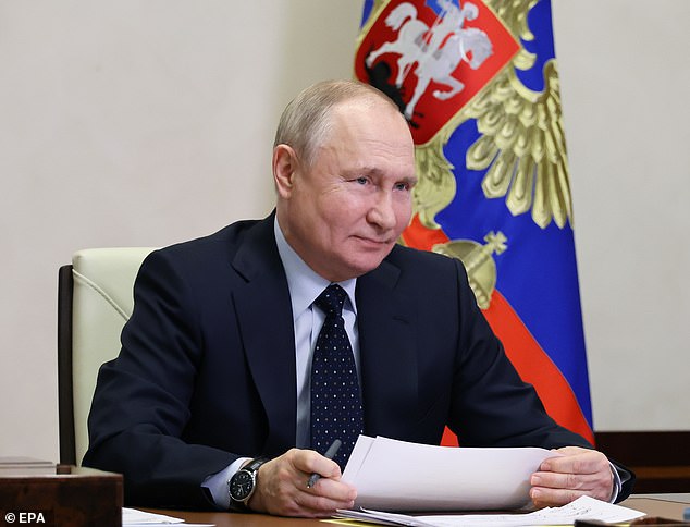 Russian President Vladimir Putin was photographed at a government briefing on Tuesday.